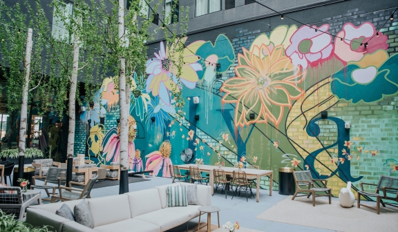 Decorative mural in the patio area at a Davidson hotel